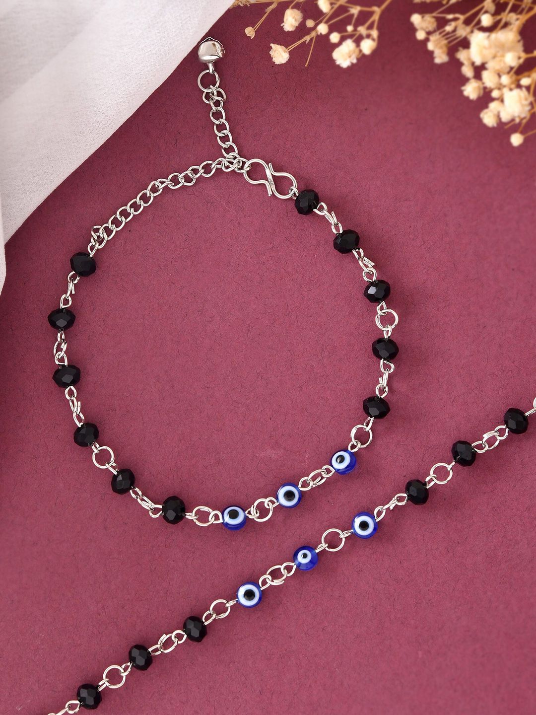 Trendy Evil Eye Payal: Stylish Silver-Toned Artificial Anklets with Black Beads for Women