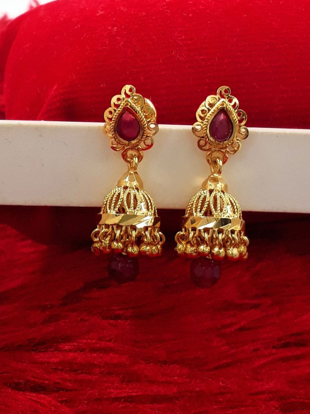 Traditional Indian Gold-Plated Jhumka Earrings with Red Stone