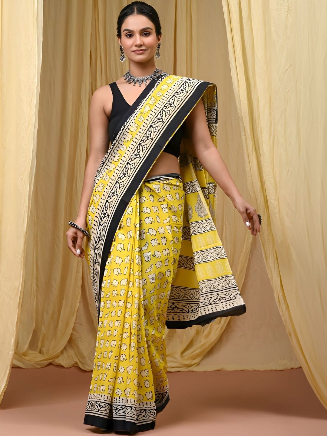 HERE&NOW Cotton Ikat Saree with Ethnic Motifs